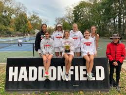 Members of the Girls Tennis team, pictured with Coach Holman, on November 3, 2020.