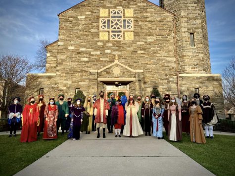 The 2020 Madrigals Singers pose in front of Christ the King Church 