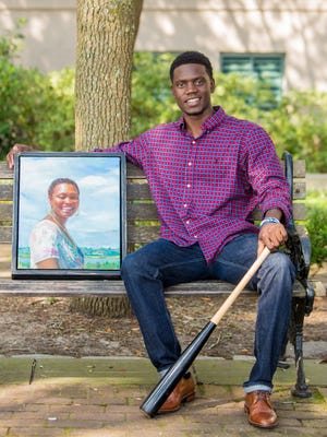 Keynote Speak Chris Singleton featured with a portrait of his mother, who was murdered in a hate crime. 