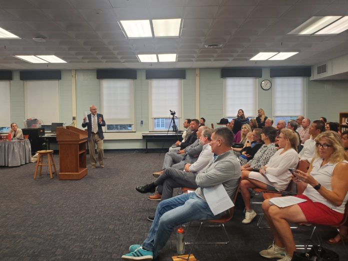 Superintendent Charles Klaus presents at a  recent Board of Education meeting